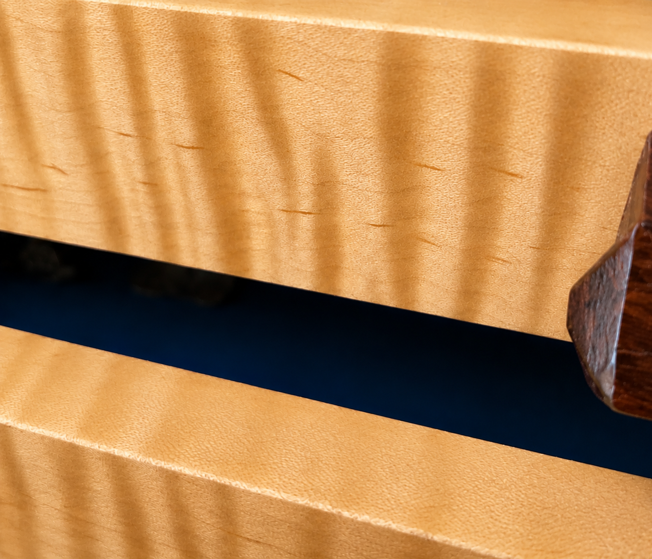 Figured curly maple drawer front on Greene & Greene inspired jewelry cabinet