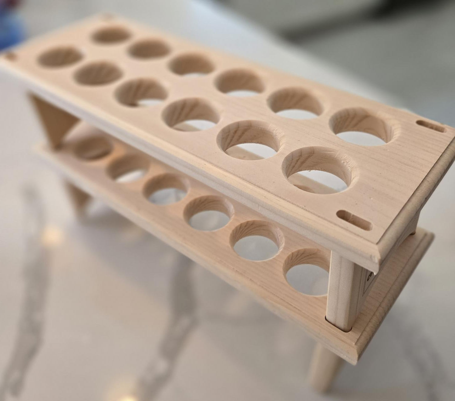 Custom wooden double-stack egg holder made from pine with curved layered design