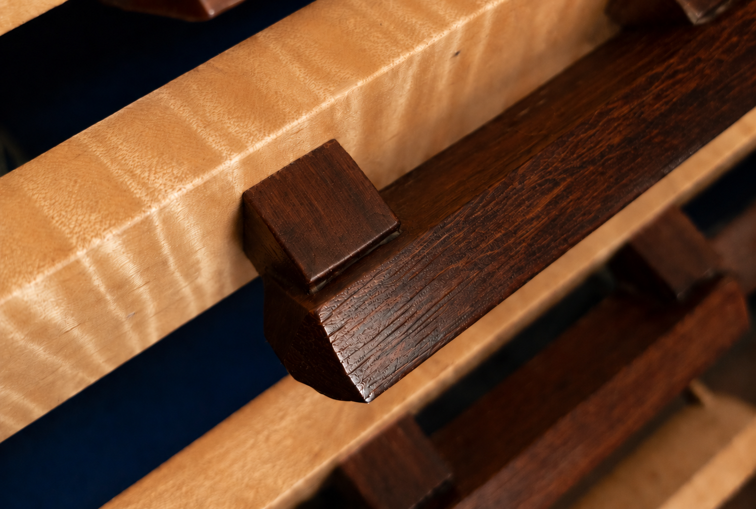 Hand-shaped padauk drawer pull on Greene & Greene inspired jewelry cabinet